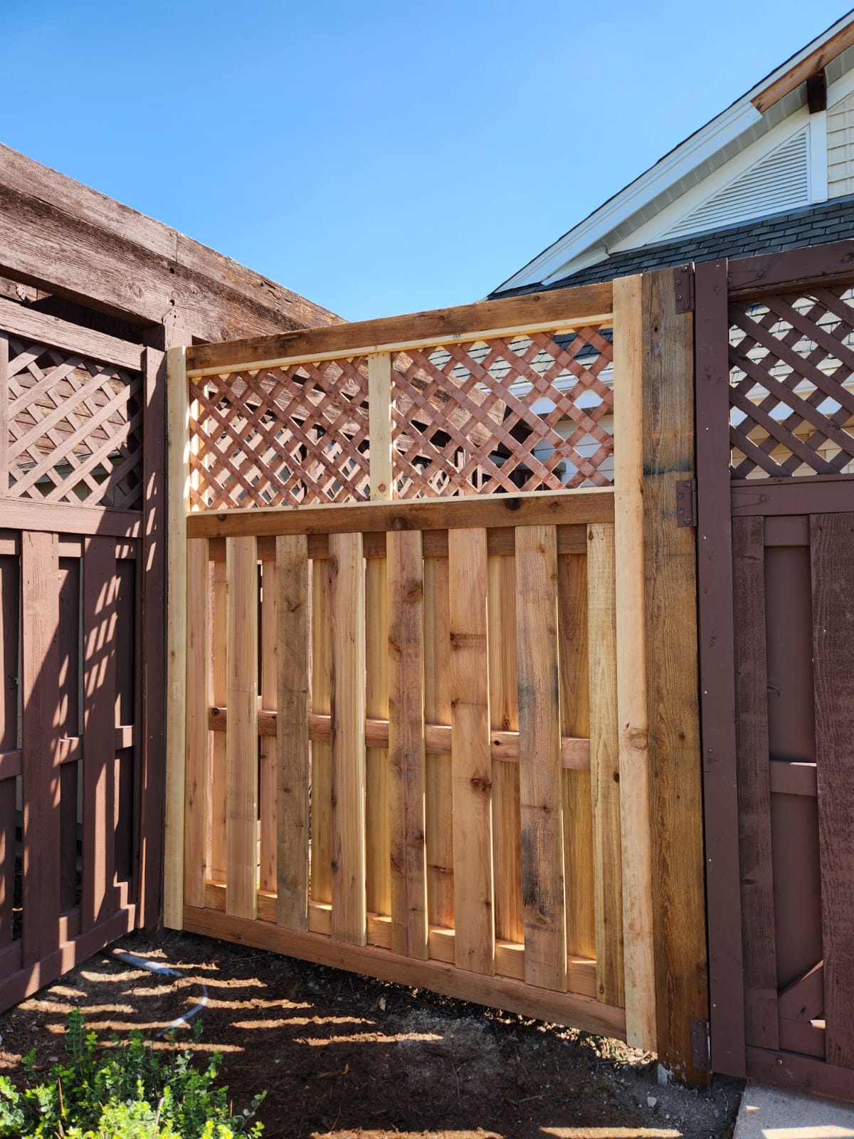 Custom cedar fence repair in Highlands Ranch