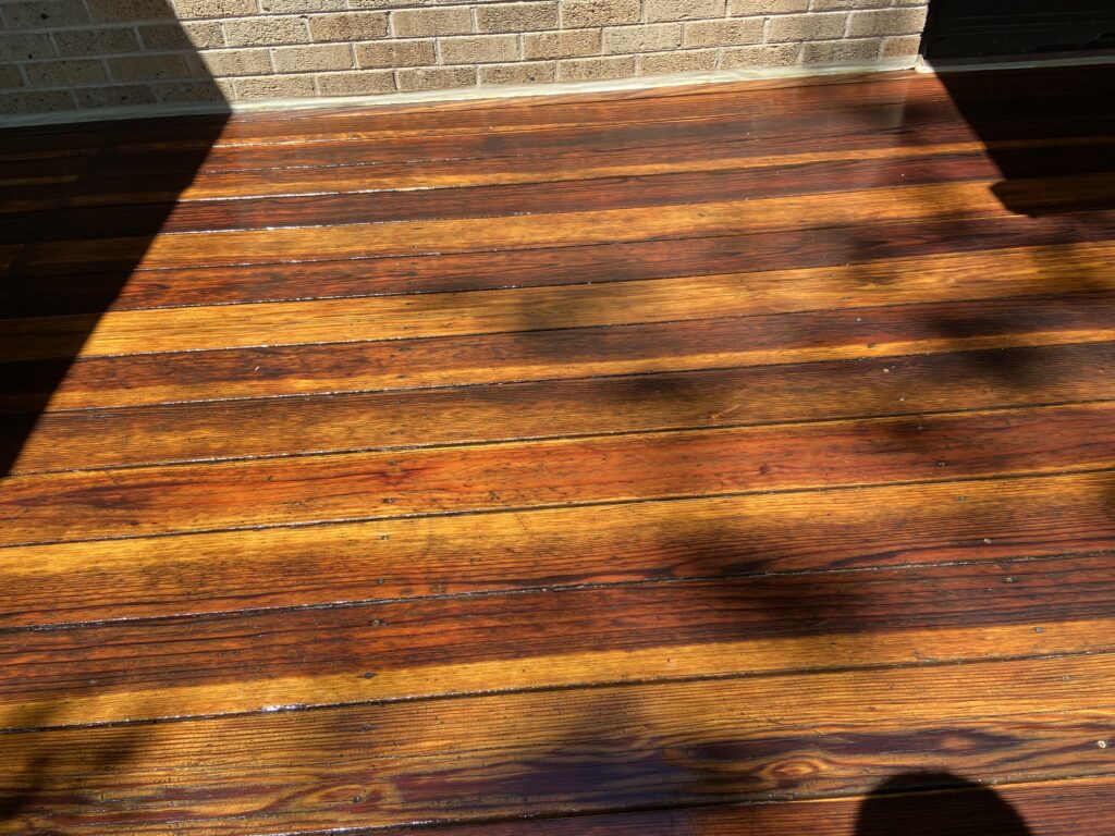 Redwood Deck Floor freshly sanded by Valenzuela Fence . Also Redwood Deck Penofin Oil Stained, which showcases a durable and elegant Redwood Deck in all residential properties all around Denver county, Arapahoe county, Douglas county and Surrounding areas.