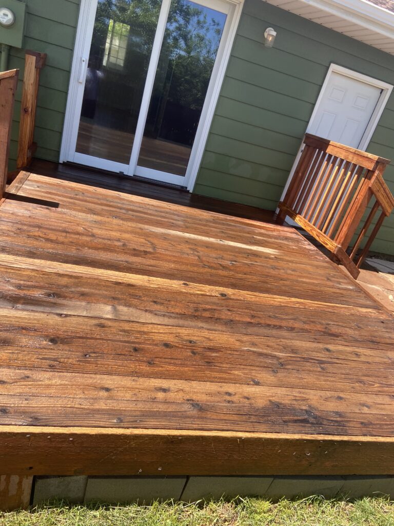 Redwood Deck Floor before restoration, after power washed by Valenzuela Fence . Also Redwood Deck showcases a durable and elegant Redwood Deck in all residential properties all around Denver county, Arapahoe county, Douglas county and Surrounding areas.