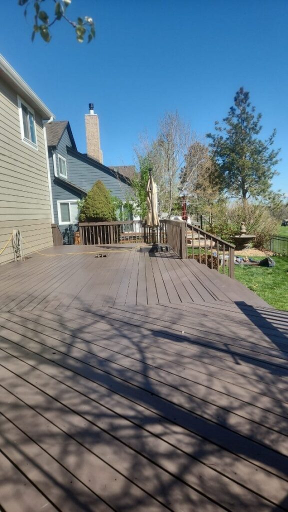 Redwood Deck Floor installed by Valenzuela Fence Company. Also Redwood Deck solid color Stained, which showcases a durable and elegant Redwood Deck in all residential properties all around Denver county, Arapahoe county, Douglas county and Surrounding areas.