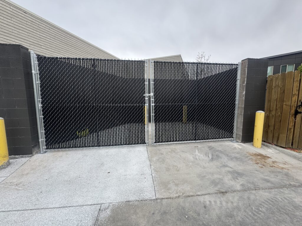 Black vinyl-coated chain link fence